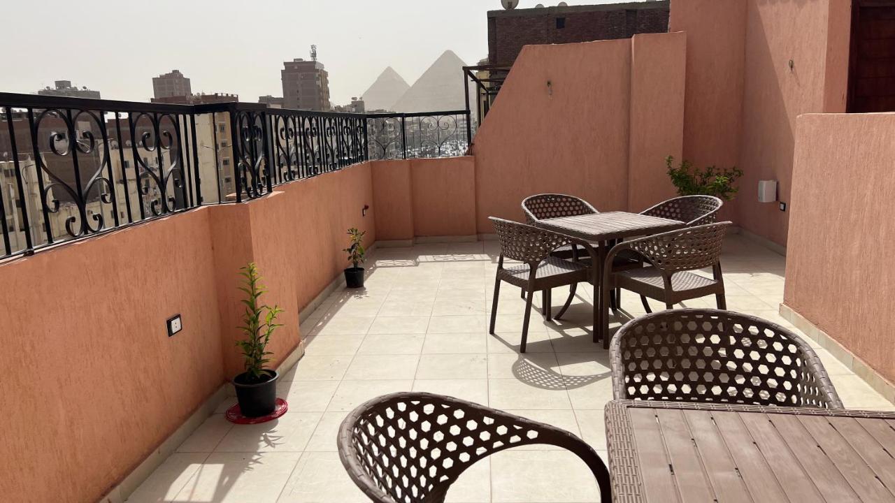 Pyramids Road Guest House Cozy Rooms And Rooftop Breakfast With The Pyramids View Nazlet el-Sisi Ngoại thất bức ảnh